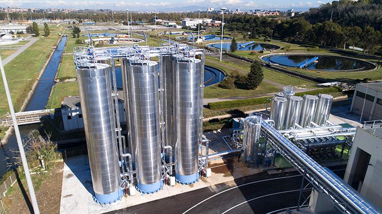 Power and water treatment plant, aerial view of process units and silos