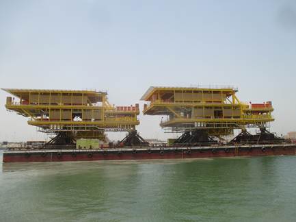 Offshore piping platforms (decks and jackets) on a load-out barge